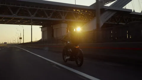 Electro bike on the road sunset Stock Footage 196699383