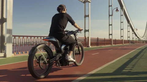 Electro bike on the road sunset Stock Footage 196699478