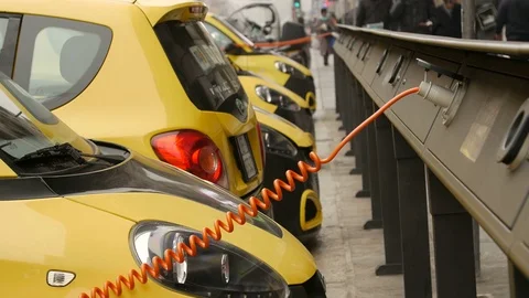 Electro car is charging in the street Video stock 74193373