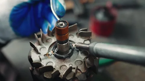 Electro motor soldering process close up Stock Footage 285640749