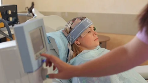 Electro-stimulation of the brain for a girl. Stock Footage 81052804