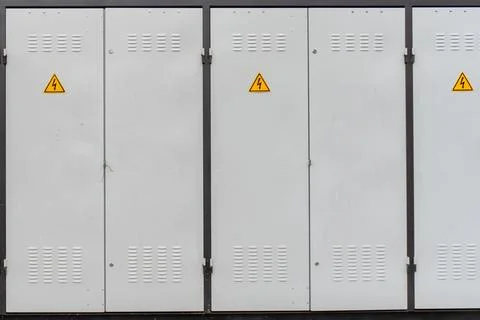 Electro Storage Battery Units Located in an Outdoor Area With Warning Signs.. Stock Photos