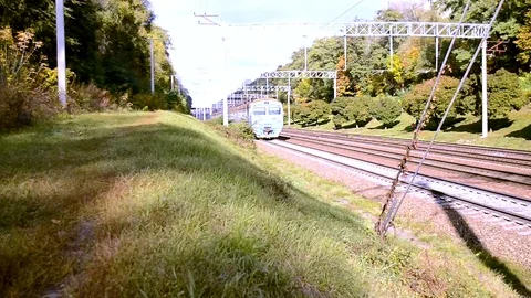 Electro Train At Sunny Day On The Front View In Diagonal Move Stock Footage 84771635
