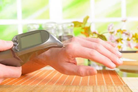 Electroacupuncture finding a point Stock Photos