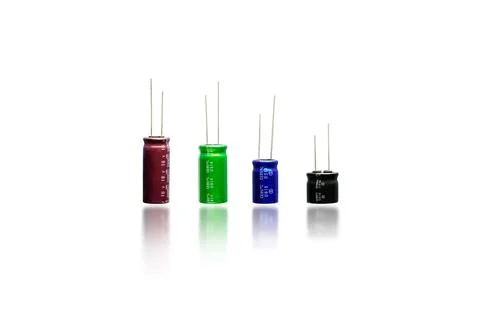 Electrolyte or electrolytic capacitor row isolated Stock Photos