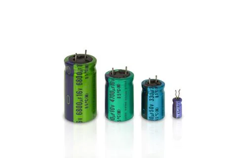 Electrolytic capacitors row with multi colors Stock Photos