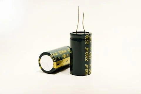 Electrolytic capacitors on a white background. Electronic elements for elec.. Stock Photos