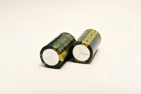 Electrolytic capacitors on a white background. Electronic elements for elec.. Stock Photos