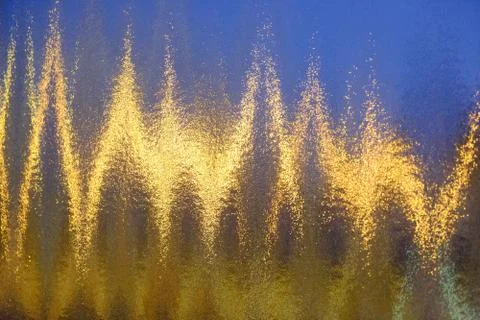 Electromagnetic lines and impulses texture on multi-colored ribbed glass Stock Photos