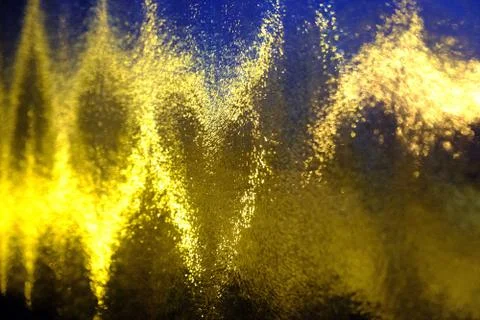 Electromagnetic lines and impulses texture on multi-colored ribbed glass 库存照片