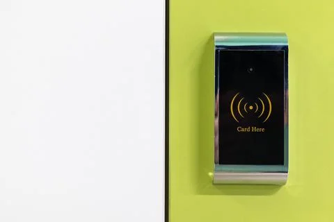 Electromagnetic lock, card access system on a yellow-and-white background Stock Photos