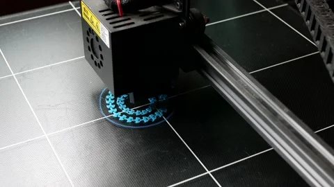 Electronic 3D printer during work. Blue plastic object is being printed in 3D Video stock 160296833