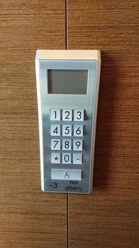 Electronic access control keypad mounted on wall Stock Photos