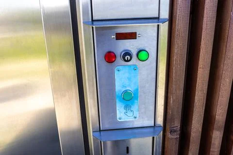 Electronic Access Panel of Public Automated Inox Toilet Stock Photos