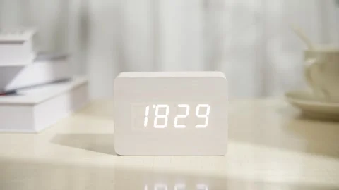 The electronic alarm clock rings at 6:30 p.m Video stock 247244242