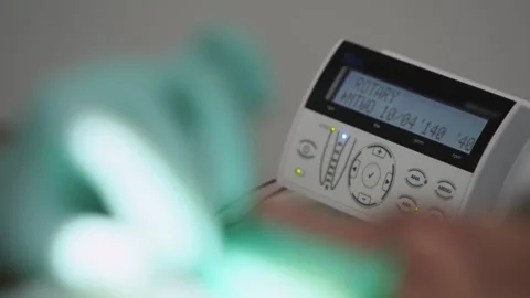 Electronic apex locator working during operation. Dentist's hands in gloves Stock Footage 270421822