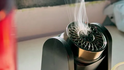 Electronic Aroma Diffuser Emitting Vapor By Window Stock Footage 346053915