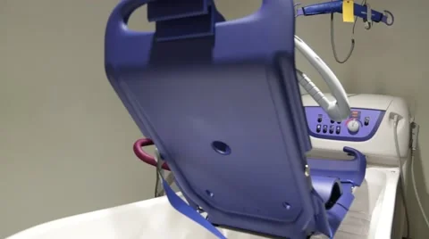 An electronic bath hoist in a UK NHS hospital Stock Footage 65730447