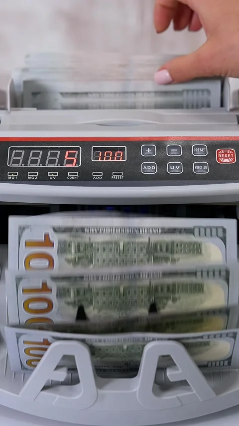 Electronic bill counter machine processing stack of hundred dollar bank not.. Stock Footage 337519422