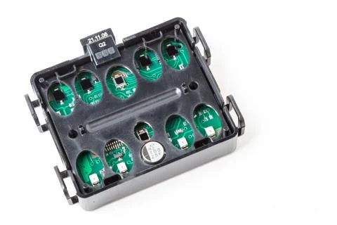 Electronic board in a black plastic box with light and rain sensors to automa Stock Photos