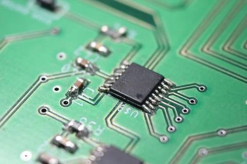 Electronic board with circuit lines and chip Stock Photos