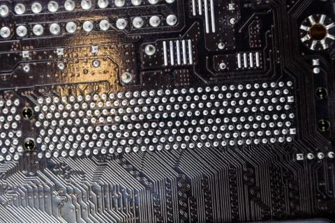 Electronic board with electrical components. Electronics of computer equipment Stock Photos