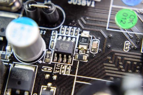 Electronic board with electrical components. Electronics of computer equipment Stock Photos