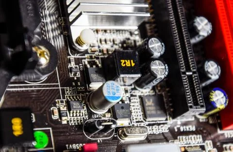 Electronic board with electrical components. Electronics of computer equipmen Stock Photos