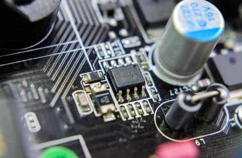 Electronic board with electrical components. Electronics of computer equipmen Stock Photos
