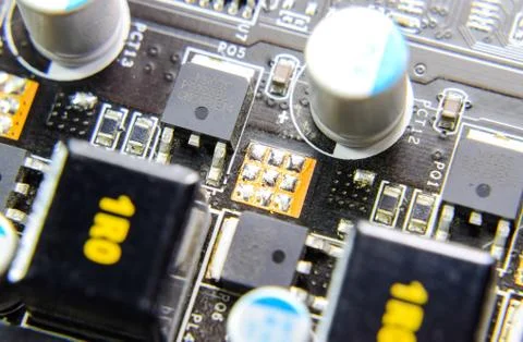 Electronic board with electrical components. Electronics of computer equipmen Stock Photos