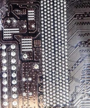 Electronic board with electrical components. Electronics of computer equipmen Stock Photos