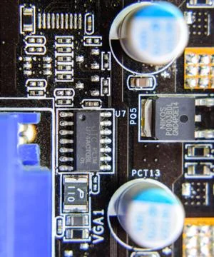 Electronic board with electrical components. Electronics of computer equipmen Stock Photos