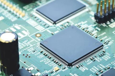 Electronic board with microchips and electronic components close-up Stock Photos