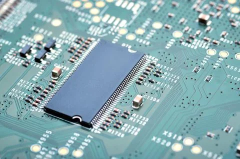 Electronic board with microprocessor and electronic parts close-up Stock Photos