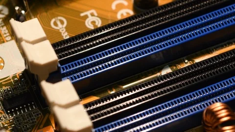 Electronic board in rotation. Ram socket on motherboard. Stock Footage 101099367