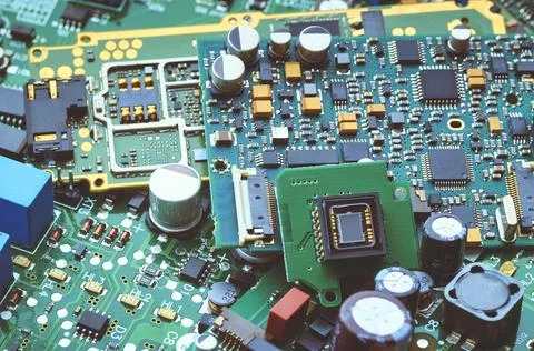 Electronic boards with chips, electronic components and precious metals Stock Photos