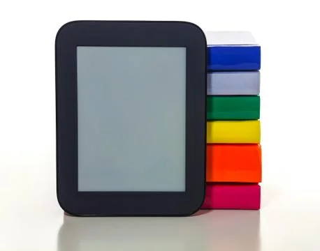 Electronic book reader with hard cover books Stock Photos