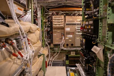 Electronic boxes and breaker panel in an electronics bay in a 787 airplane. Stock Photos