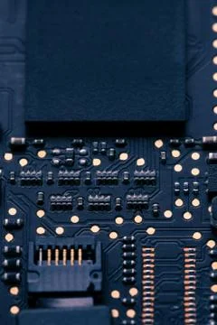 Electronic chip component on black PCB or printed circuit board Stock Photos