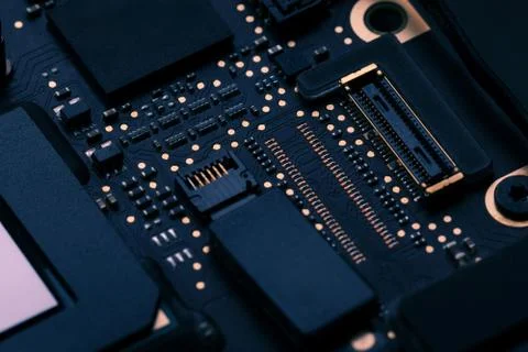 Electronic chip component on black PCB or printed circuit board Stock Photos