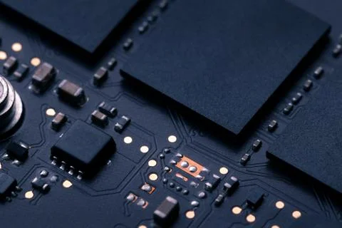 Electronic chip component on black PCB or printed circuit board Stock Photos