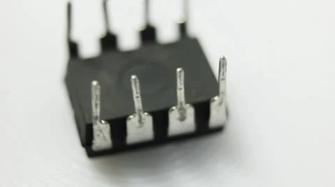 Electronic chip rotating on white background Stock Footage 25095438