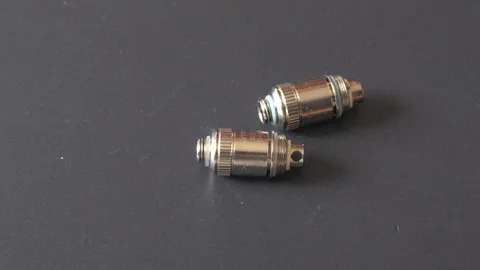 Electronic Cigarette Heating Coils clustering (Electronic Waste) Video stock 124790469