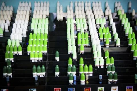 ELECTRONIC CIGARETTE In a shop selling e-cigarettes, Paris, France. Copyri... Stock Photos