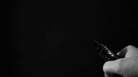 Electronic Cigarette Smoke on Black Background Stock Footage 81705010