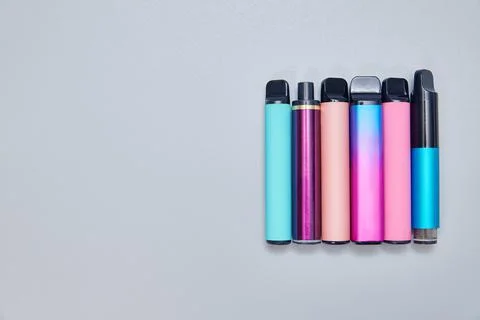 Electronic cigarettes top view. background with copy space Stock Photos