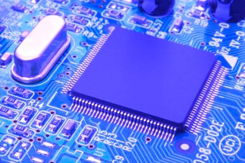 Electronic circuit board close up with different lighting. Stock Photos