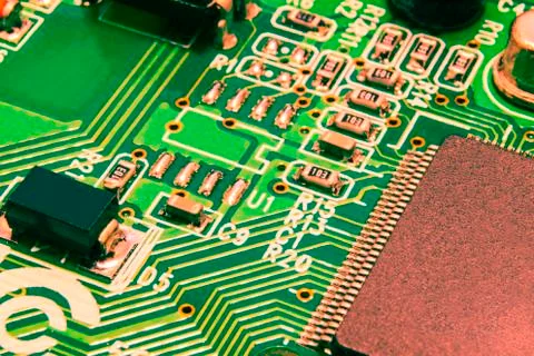 Electronic circuit board close up with different lighting. Stock Photos