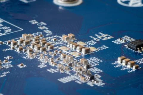 Electronic circuit board with processor, close up. Stock Photos