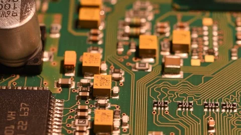 Electronic circuit board in rotation. Macro detail of printed electronic board. Stockbeeldmateriaal 101098865